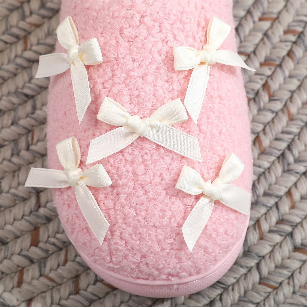 Women's Korean style bow slippers in white and pink, plush upper, TPR sole, flat heel, sizes 36-45