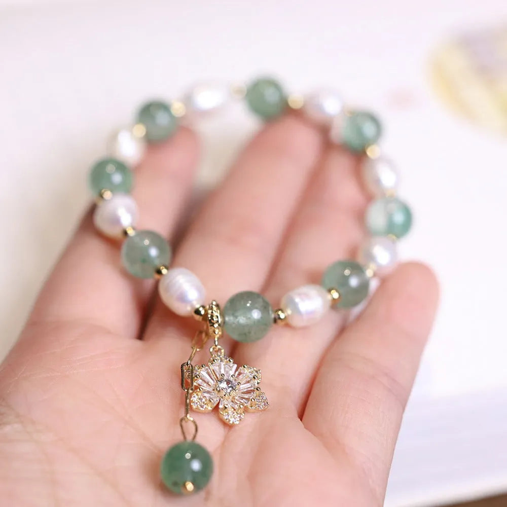 Green strawberry freshwater pearl bracelet with Chinese knot and peace buckle design
