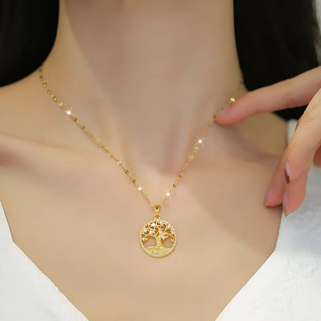 Gold-plated lucky tree pendant necklace with micro-inlaid rhinestones on an adjustable stainless steel chain.