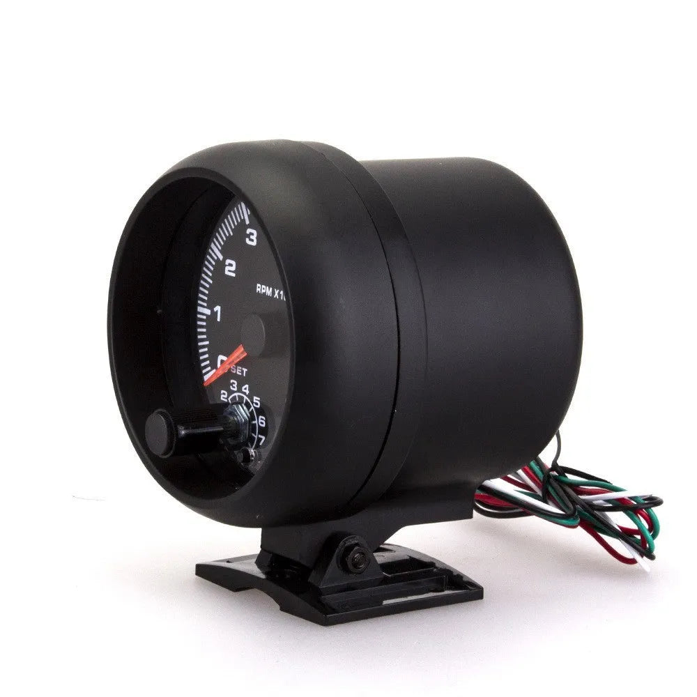 Black automotive digital tachometer with blue laser pointer for engine RPM measurement