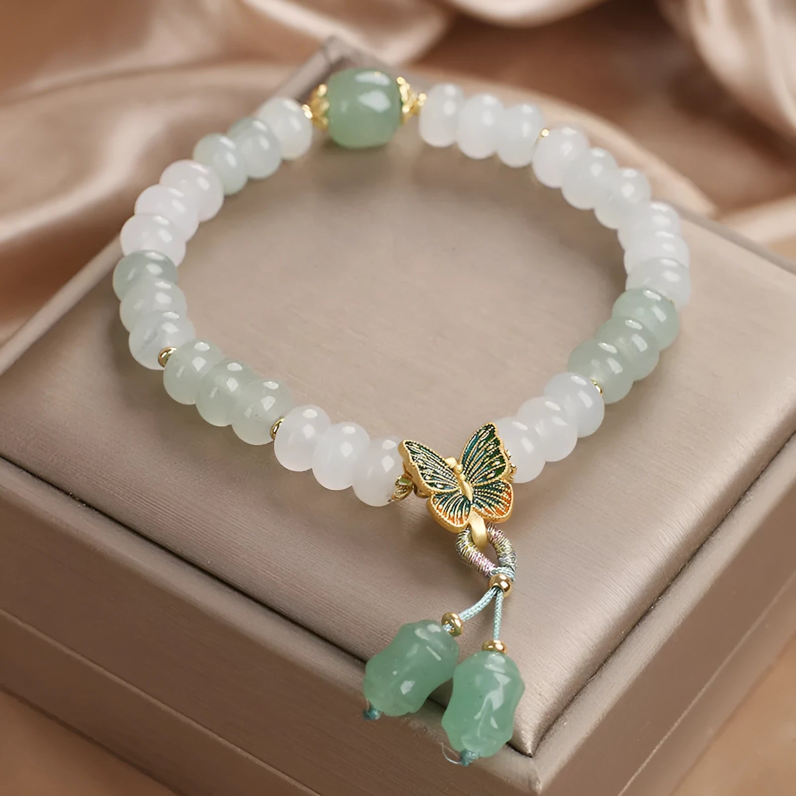 Green Tian Shan Cui abacus beads jade bracelet with retro butterfly and crystal tassel decoration
