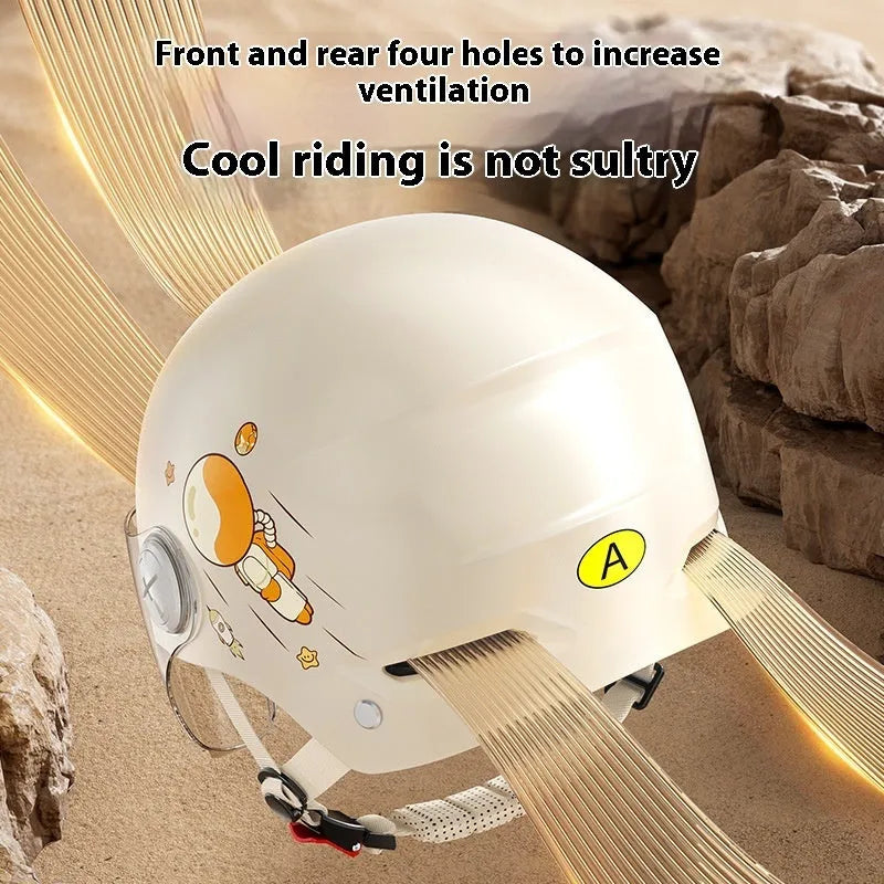 Khaki coloured open-face motorcycle helmet with a mirrored sun visor attached on a table.
