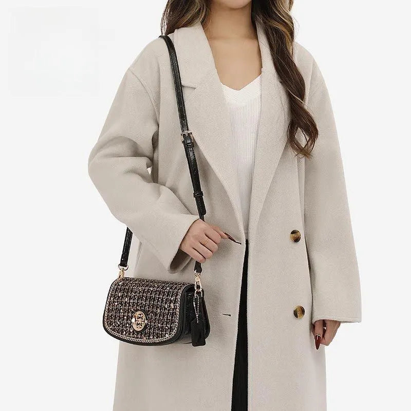 Black polyester crossbody shoulder bag with chain strap for commuter leisure travel