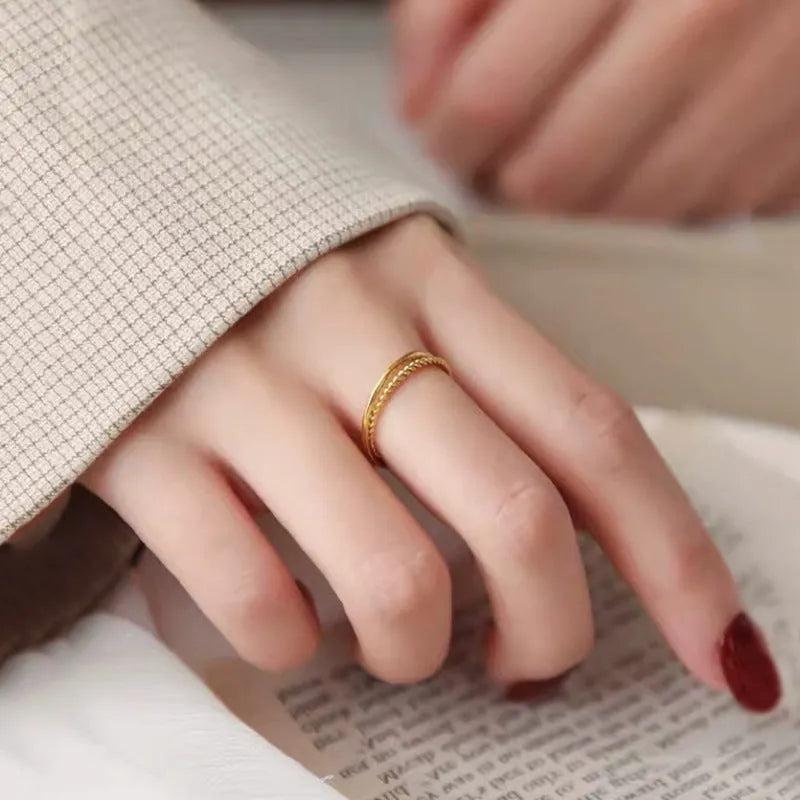 Simple brass gold plated women's bracelet ring showing matte, glossy and twist design options