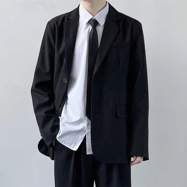 Plus size men's college style suit set featuring a jacket, trousers, white shirt and tie on a hanger.