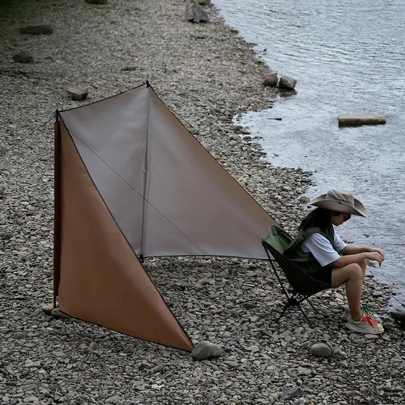 Oxford cloth camping windshield tent in Army Green with support poles and ground nails for outdoor stove cooking