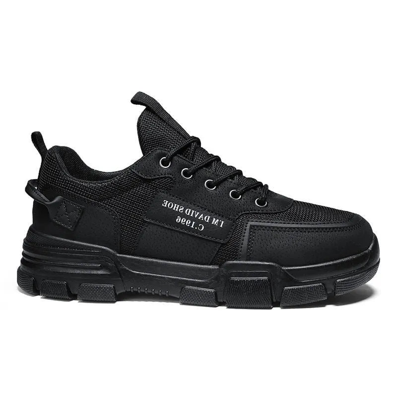 Breathable mesh sports shoes in black with lace-up closure and rubber sole, flat heel, hollow pattern upper