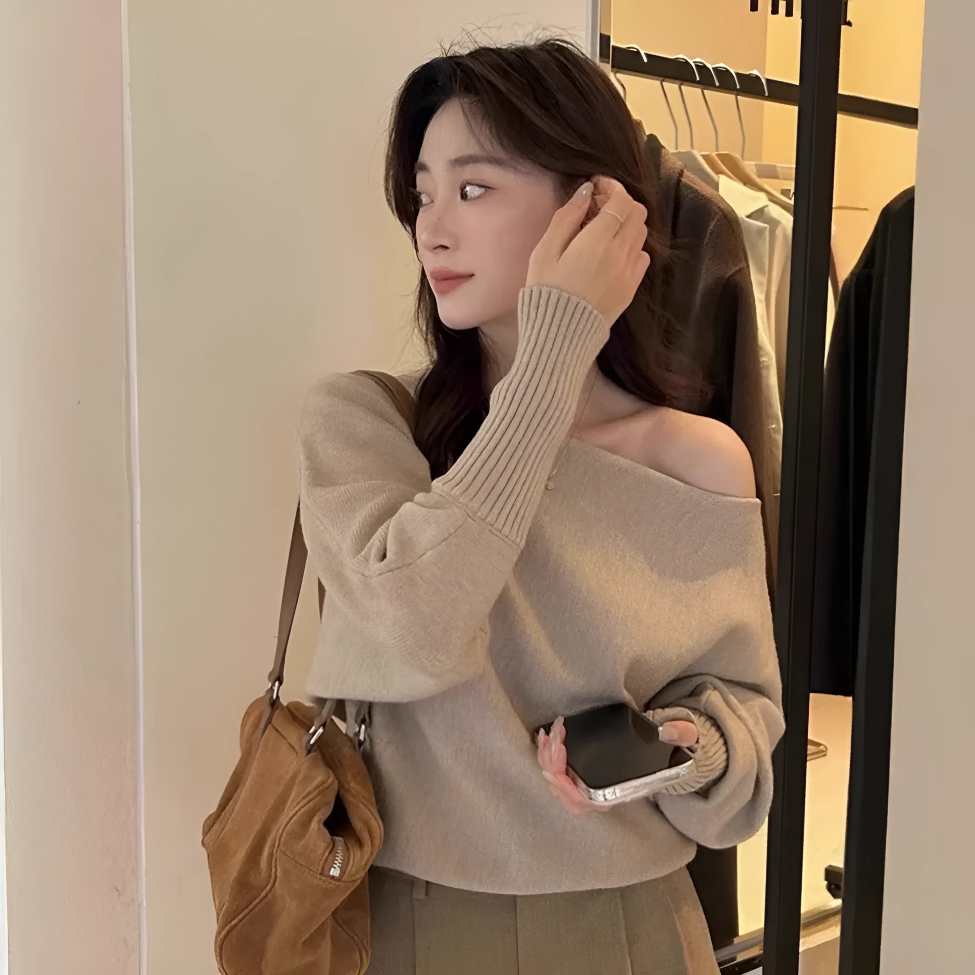 Women's light grey viscose fibre lazy blouse with long sleeves, shown in a relaxed fit.