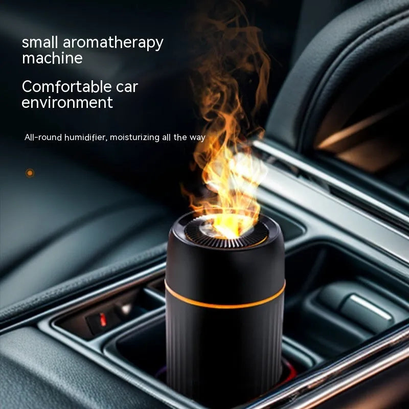 Black car aroma diffuser with flame simulation effect on a car dashboard