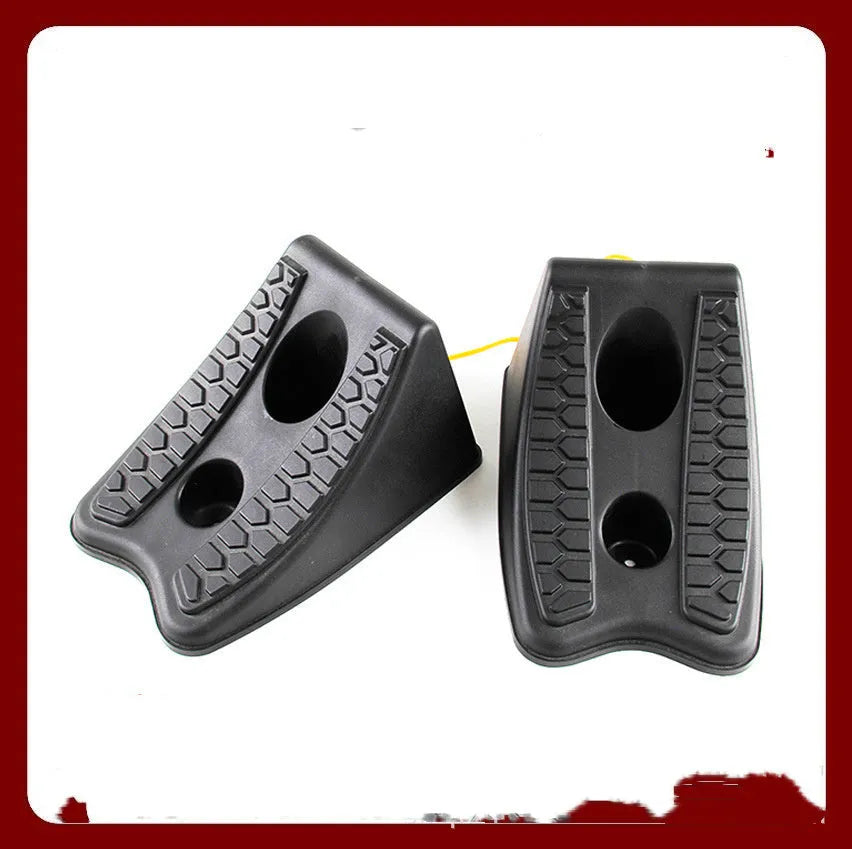 Black rubber automobile universal wheel stopper with triangular anti-slip base on sloped ground