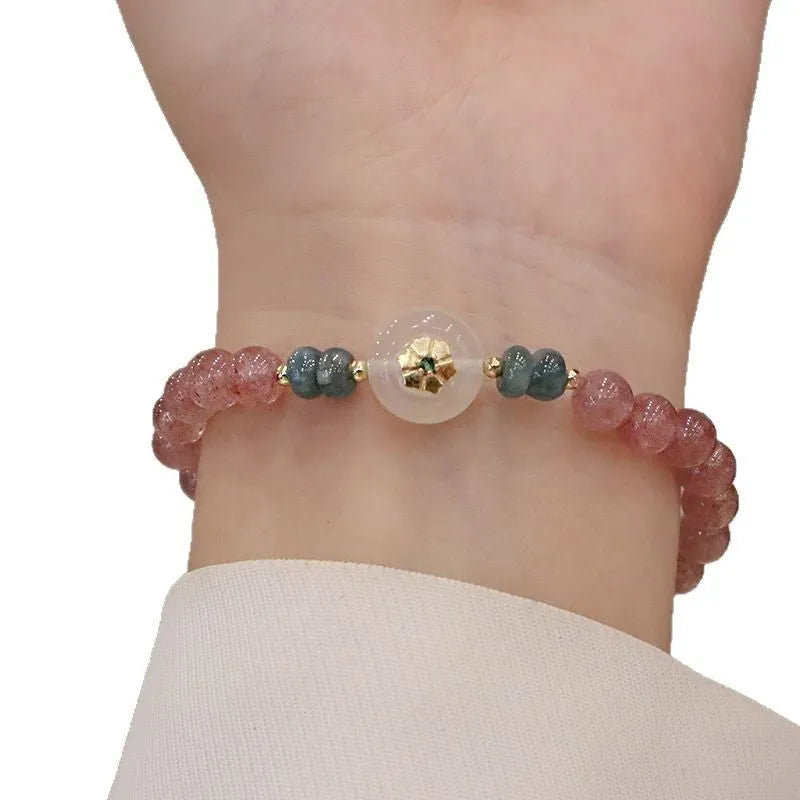 Strawberry quartz bracelet with blue water emerald pendant and Chinese geometric motifs