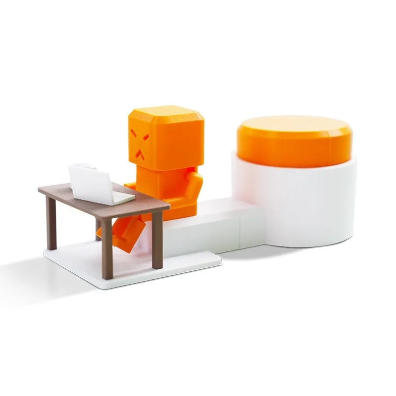 Orange plastic vent decompression toy on a table, dimensions 16cm by 6cm by 7cm.
