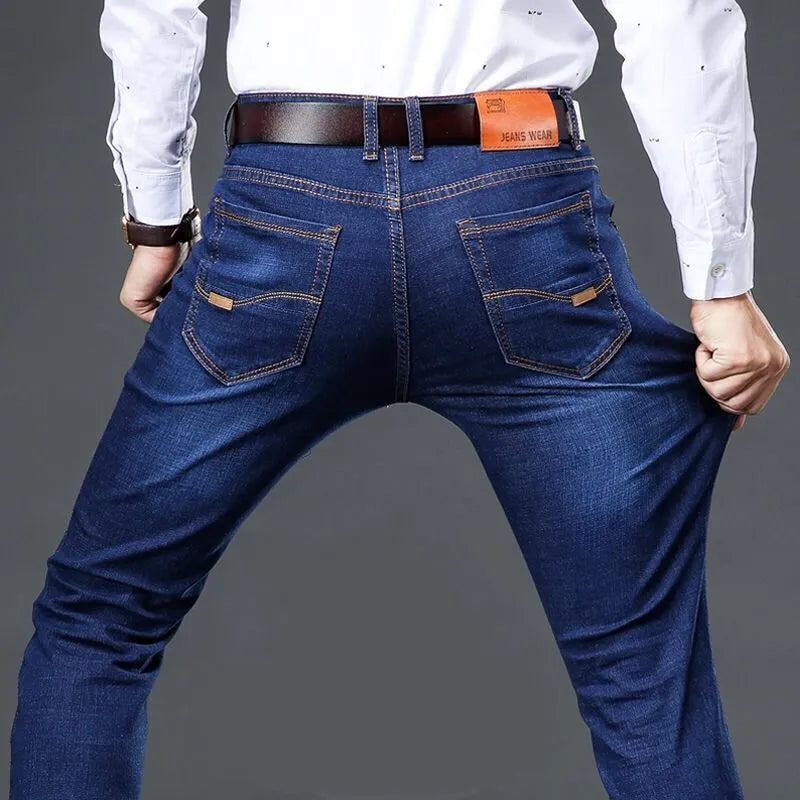 Elastic men's straight tube loose casual jeans in denim, blue colour, side view showing straight leg and waistband