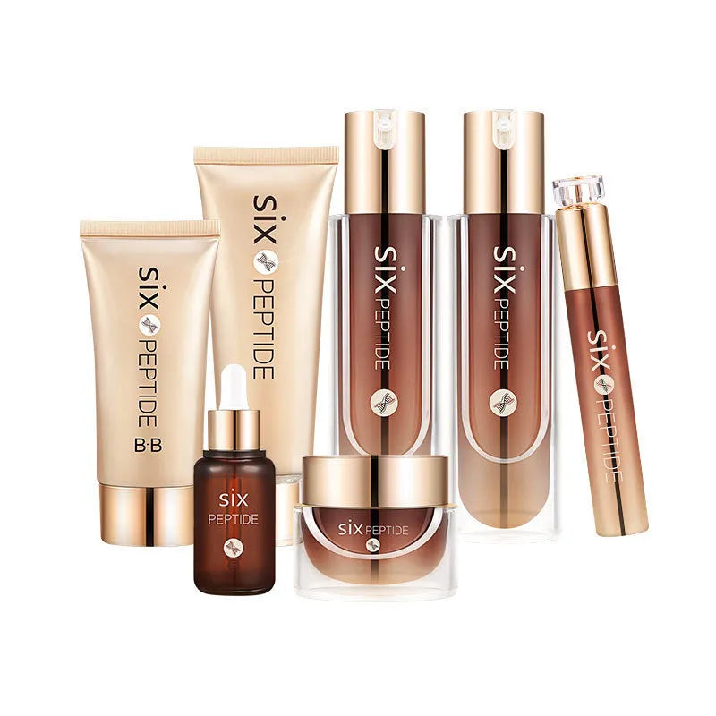 Hexapeptide skin care set of seven bottles and jars including toner, cleanser, cream, essence, eye cream, and BB cream on white background