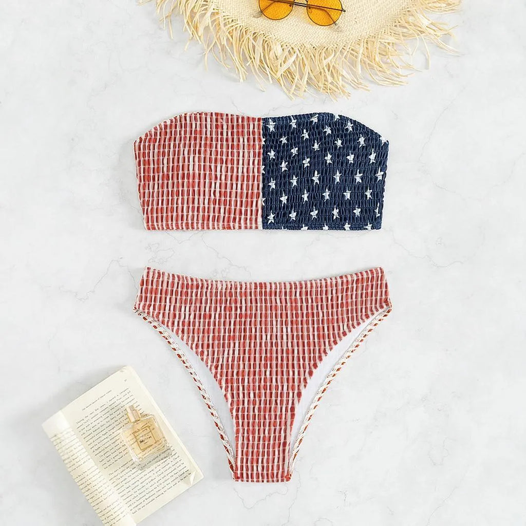 Women's red and blue high elasticity polyester bikini set on a beach background