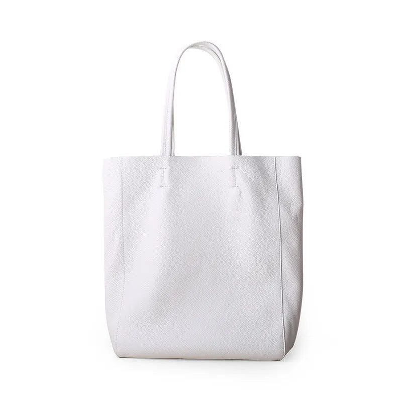 Large first layer cowhide leather tote bag with soft handle, plain design with car stitching, available in multiple colours