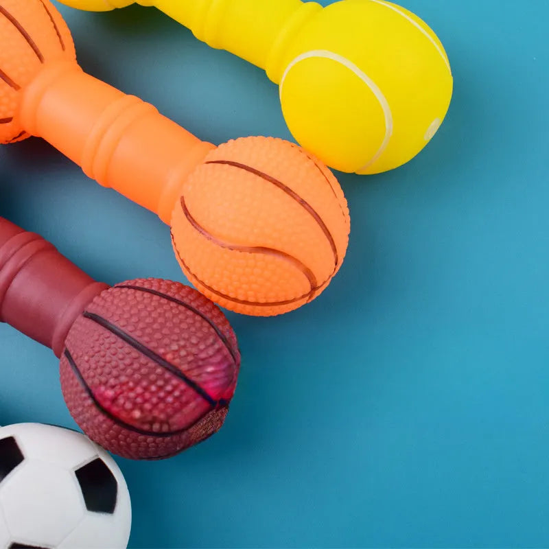 Brown, orange, white, and yellow PVC football dumbbell shaped dog chew toy with squeaker.
