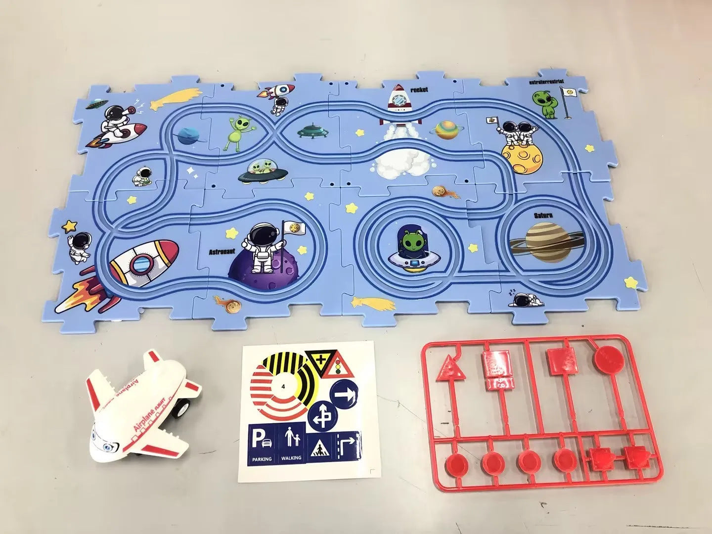 Children puzzle electric railroad speeder DIY assembly track set with automatic car and plastic pieces in multiple themes