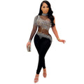 Transparent mesh rhinestone one-shoulder jumpsuit for women in black with tight trousers