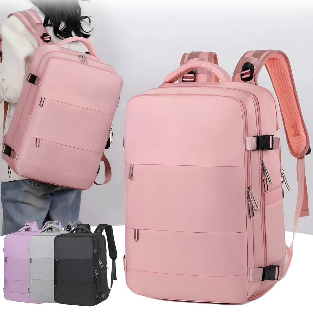 Large purple travel backpack with multiple compartments open, showing laptop sleeve and organiser pockets.