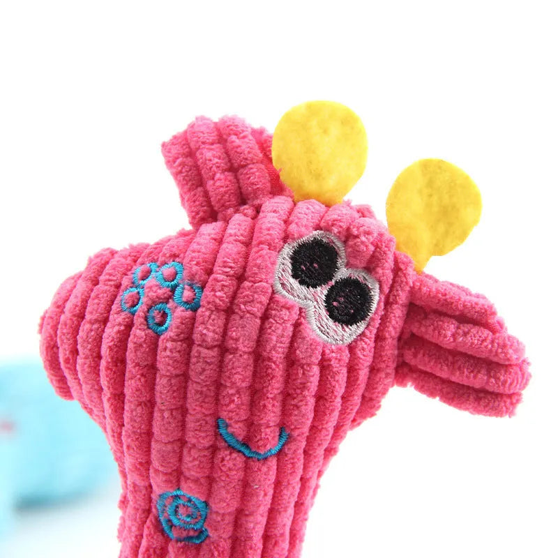 Blue deer-shaped plush dog toy with corn grain texture on a white background