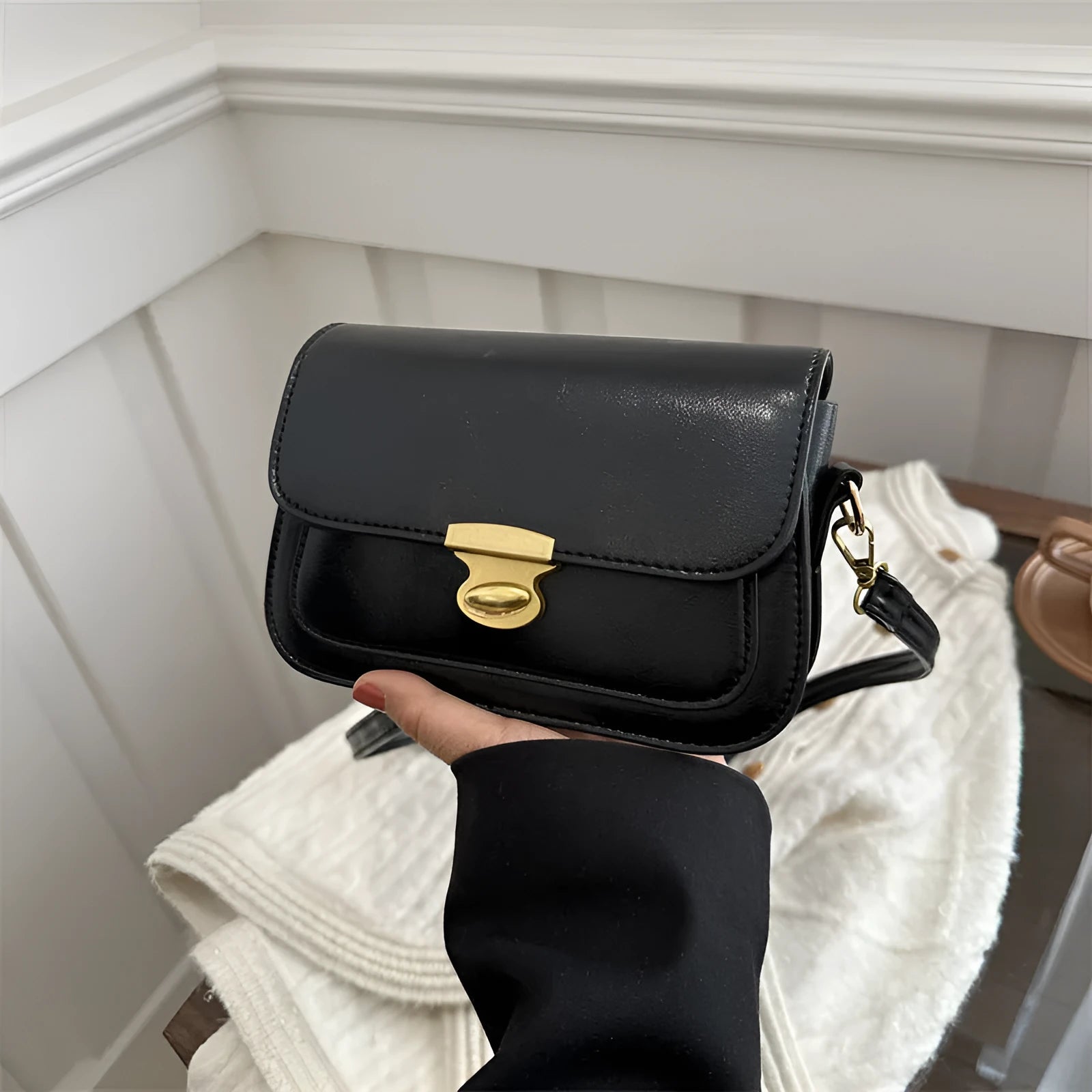 Small retro square shoulder bag in soft PU leather showing horizontal rectangular shape