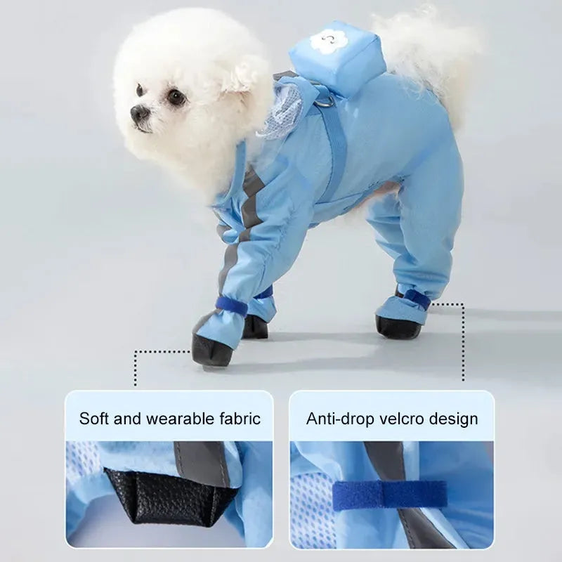 Blue pet dog raincoat with full body and four leg coverage on a small dog