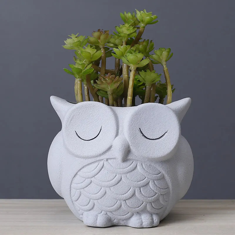 Handmade ceramic succulent pot with cartoon owl design in frosted pastel colour