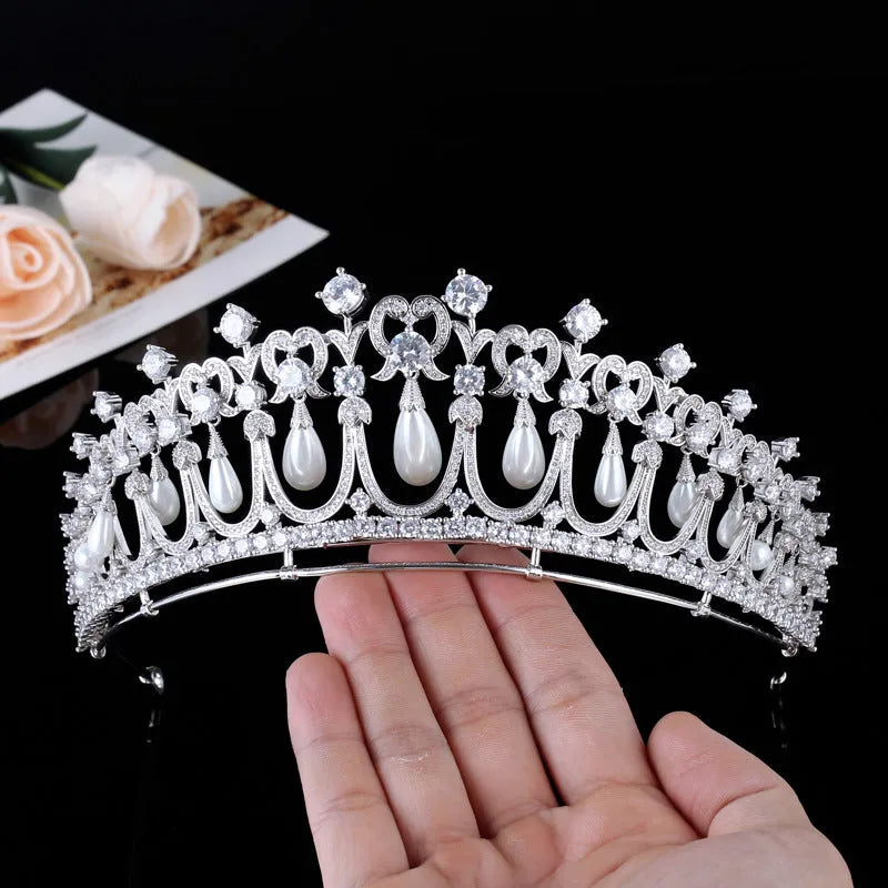 Silver bridal wedding tiara with AAA zircon and pearl tears on white background