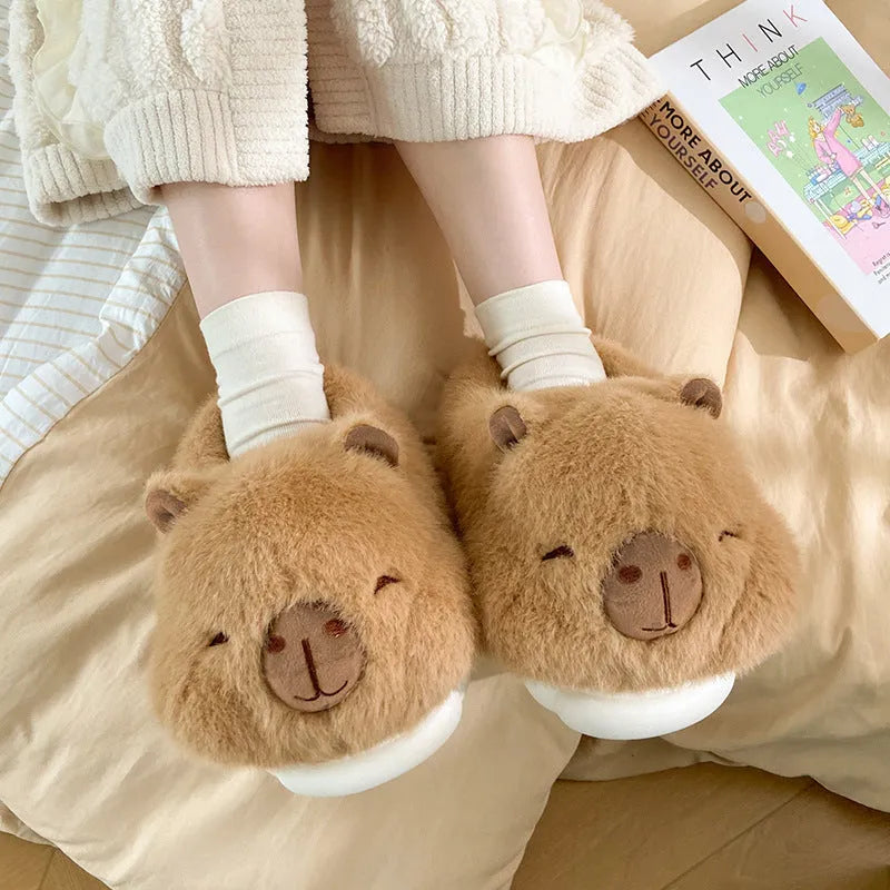 Women's light brown winter slippers with plush upper, artificial wool lining, and cartoon pattern in UK sizes 36-41