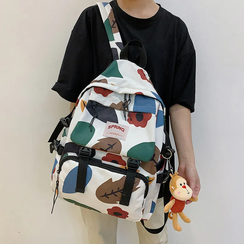 Mori style contrast colour nylon travel backpack for students, geometric pattern, black colour, 20-35L capacity