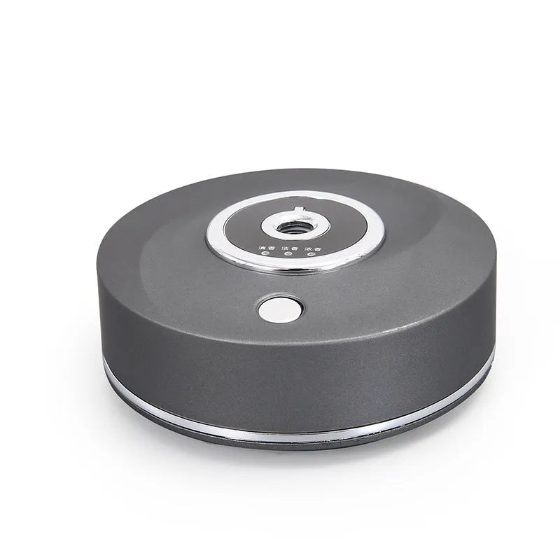 USB car aromatherapy machine in black, grey, or white with anti-slip pad on dashboard