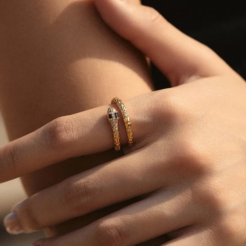 Snake-shaped adjustable copper ring with gold colour plating and diamond surface treatment