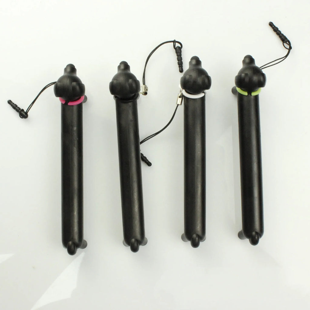 Black dog-shaped touch screen stylus shown with phone holder configuration