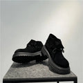 Men's distressed brown cow suede worker boots with thick soles and visible stitching.