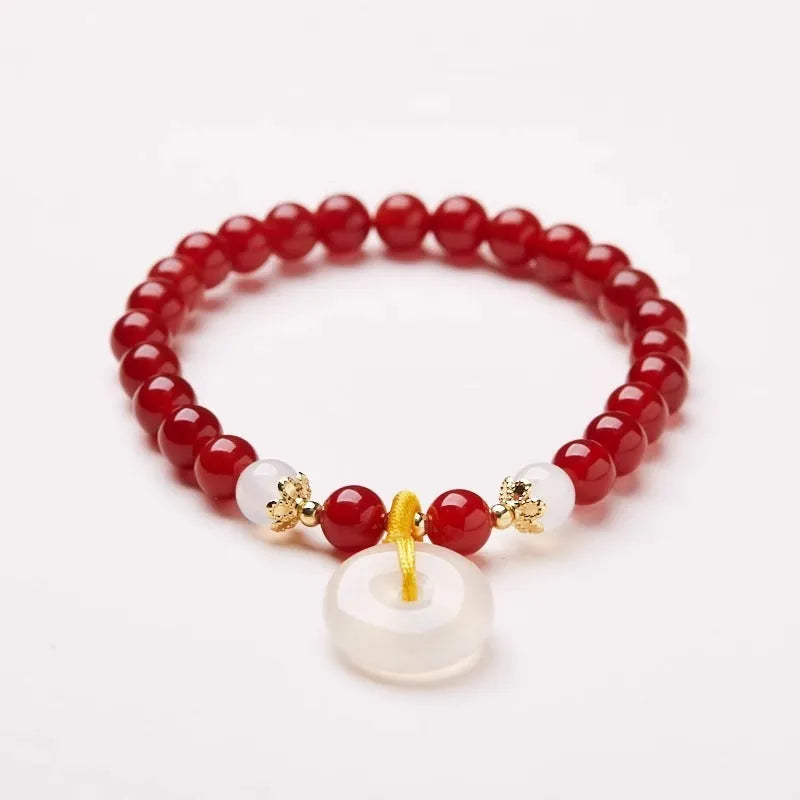 Handmade natural jade safety buckle bracelet with agate and strawberry quartz beads.