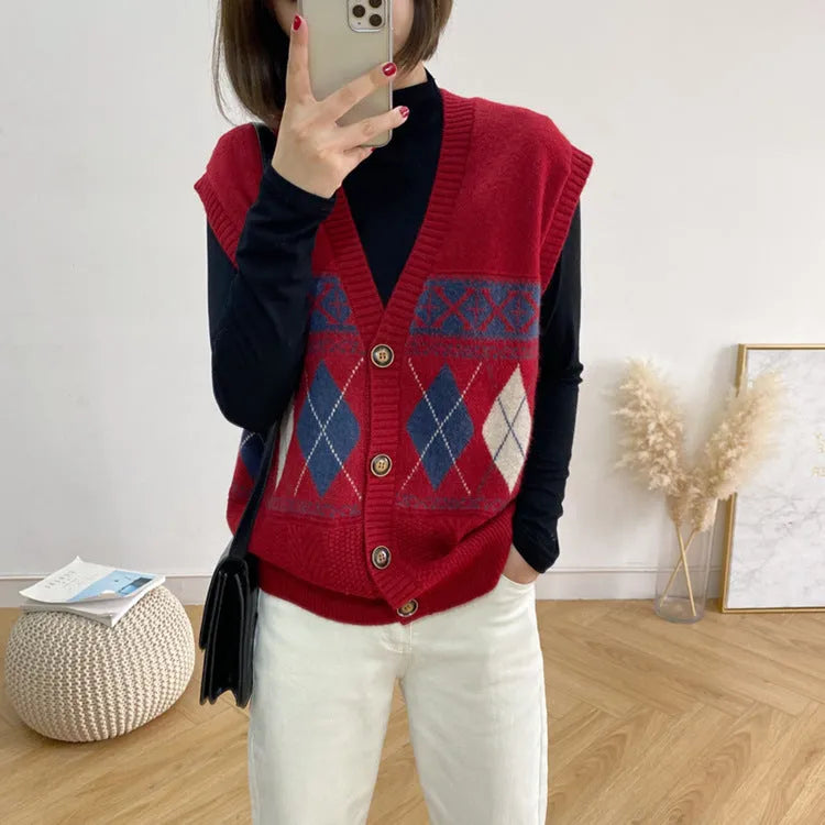 Khaki diamond plaid sleeveless loose cardigan top on a hanger