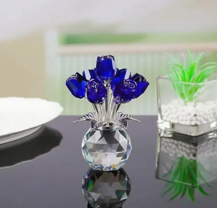 Geometric K9 crystal glass rose decorative craft in multiple colour options on a table.
