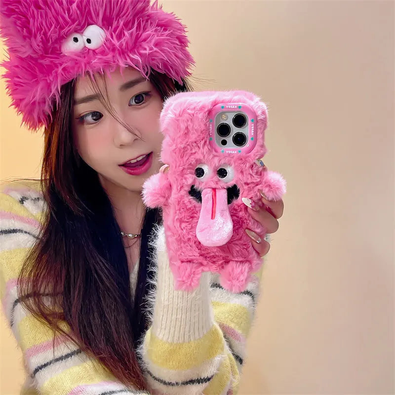 Soft plush phone case with green cartoon monster sticking tongue out, for iPhone.