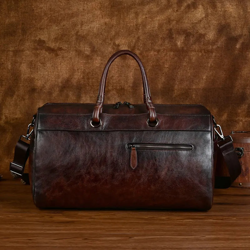 Genuine leather retro handbag in vintage brown colour showing handmade construction details
