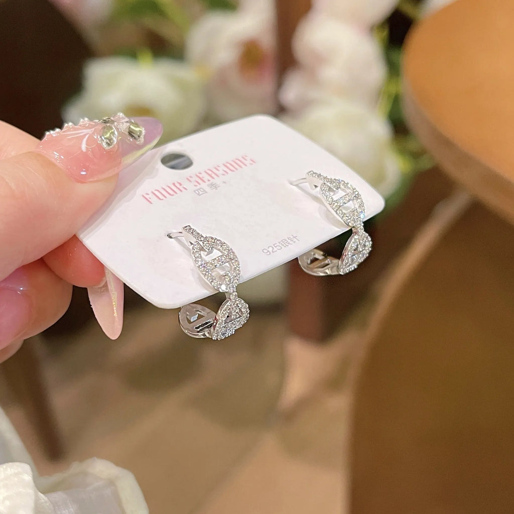 Ladies diamond design earrings in silver, gold, or rose gold finishes with thick gold plating on copper