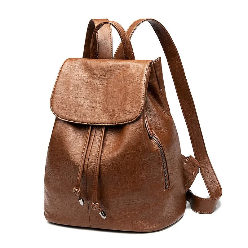 Black Korean-style genuine leather women's backpack with multiple interior compartments and street fashion design