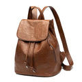 Black Korean-style genuine leather women's backpack with multiple interior compartments and street fashion design
