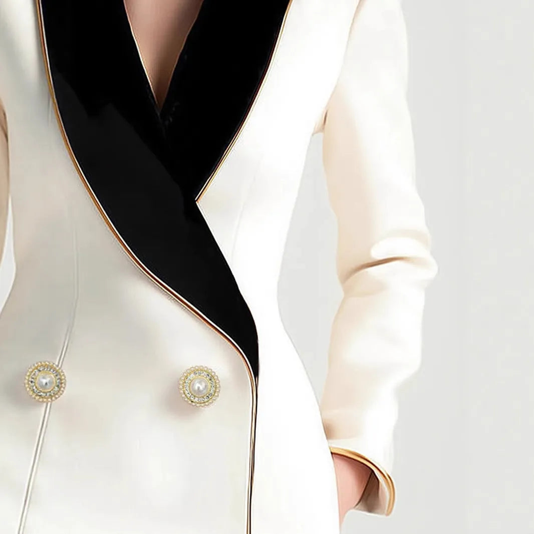 Women's beige long sleeve coat with golden pearl buttons and irregular hemline