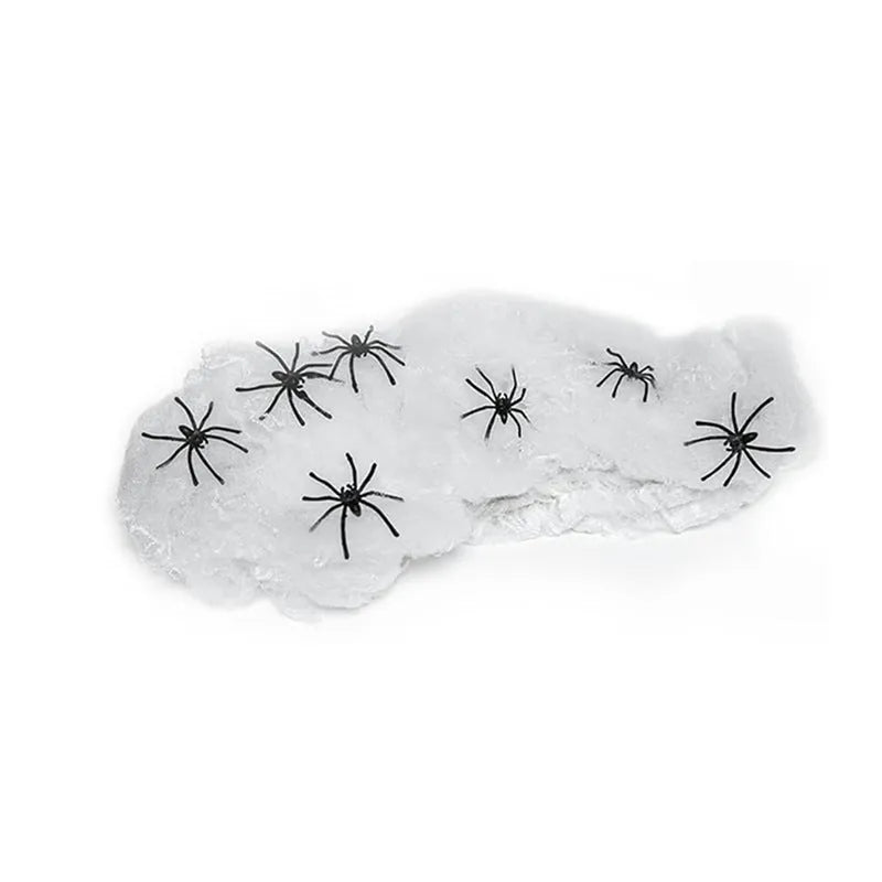 White cotton spider web Halloween decorations showing various weight packages with included plastic spiders
