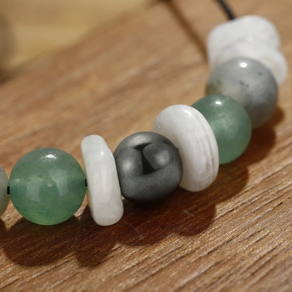 A geometric stone beaded bracelet for women on a wrist, shown in Colour 3906.