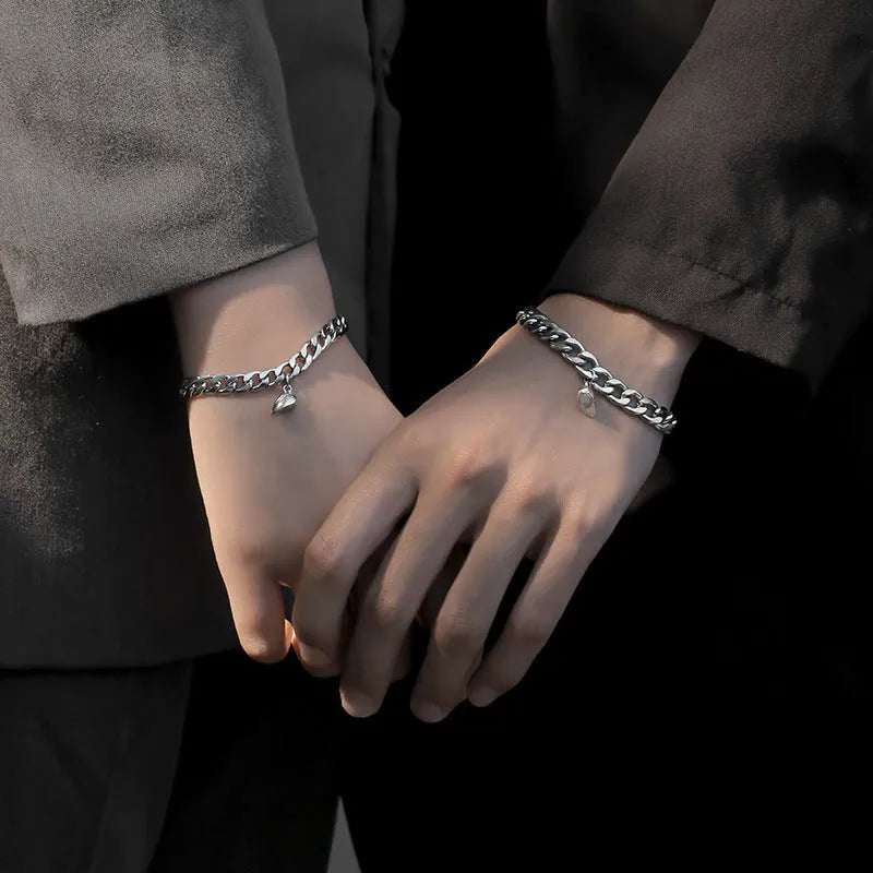 Magnetic couple bracelet set with silver heart charm on stainless steel chain