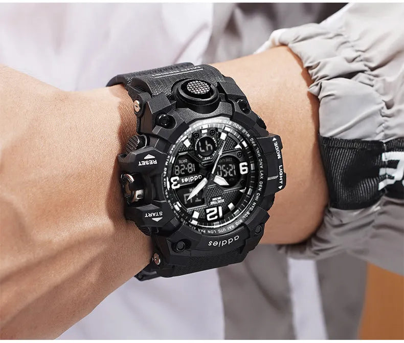 Men's black and red dual display electronic sports watch with a round plastic case and stainless steel buckle.