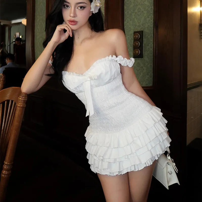 White women's wrap bust halter dress with splicing detail, sleeveless strappy short skirt style