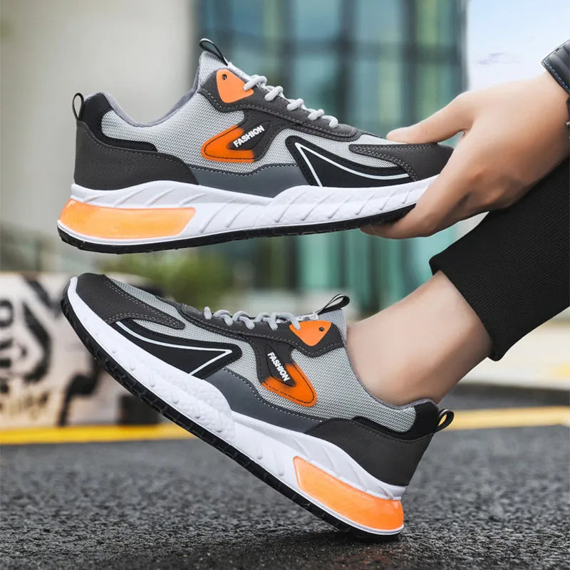 Colour-blocked men's mesh trainers with rubber sole, front lace-up, flat heel, round toe, in Black Green, Black Orange, or Grey Orange.